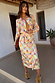 Thumbnail for Iconic Check Sun Jaspre Skirt in a colourful checkered print with sun motifs and a signature wrap tie fastening.