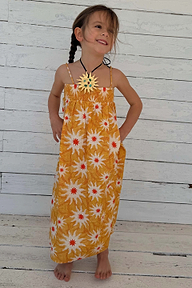NFD Kids Yellow Cotton Sun Dress featuring a sunburst print, shirred top and floaty maxi skirt.
