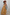 Thumbnail for NFD Kids Yellow Cotton Maxi Sun Dress with a sun print and shirred bodice on a young girl.