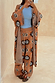 Thumbnail for Tan Sun Trousers in a knit sun print, rolled at the waist and styled with a matching cardigan and blue top.