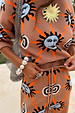 Tan Sun knit co-ord with hand-painted sun motifs, featuring a drawstring waist and soft stretch finish.