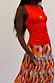 Orange Sun Twisted Strap Tank in ribbed jersey with sun embroidery, paired with a colourful diamond print skirt.