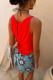 Bright orange Sun Twisted Strap Tank in ribbed jersey with a draped back and twisted strap detail.