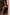 Thumbnail for Black Studded Acetate Sunglasses with silver studs and tinted lenses, paired with a palm tree motif swimsuit.