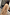 Thumbnail for Tan Trench Coat with gold studs on the sleeves and a belted waist, designed in London for outdoor styling.