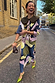 Teal Mara Abstract Dorris Skirt in a hand-painted print, paired with a matching cardigan on a London street.