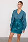 Teal Vegan Leather Mini Jaspre Skirt with a wrap waist, paired with a matching teal blouse for a chic tonal look.