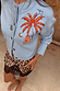 Blue Tigress Cardigan with embroidered palm tree and tiger, paired with a leopard print and lace skirt.