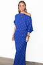 Model wearing the cobalt blue Tilly Plisse Dress with silver dots and an off-the-shoulder silhouette.