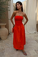 Red Tomato Lola Mid-axi Dress featuring a strapless ruched bodice and cotton skirt, perfect for a summer vacation.
