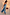 Thumbnail for Blue Lace Balloon Trousers in a washed blue satin with delicate lace trims and elasticated ankles on a walking model.