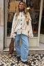 Thumbnail for Cream Western Knitted Cape with green star motifs, black buttons and thick fringe detailing.