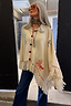 Cream Western Knitted Cape with embroidered motifs, red contrast stitching and long fringe hem detailing.