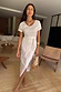 Thumbnail for White Jesse Jersey Wrap Dress with a classic tee bodice and adjustable wrap tie for multi-wear styling.