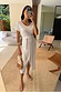 Thumbnail for White Jesse Jersey Wrap Dress featuring a T-shirt top and adjustable wrap tie, styled casually in a mirror selfie.