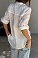 White Miley Shirt with embroidered back neck logo and rolled sleeves, showing its lightweight, oversized fit.