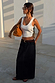 White Scoop Neck Rib Tank in a soft stretch rib, styled with a dark denim pencil skirt and tan suede bag.