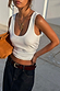 White Scoop Neck Rib Tank with a soft ribbed texture, styled with dark denim and gold accessories.