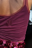 Thumbnail for Burgundy Teddy Vest featuring delicate mesh trim and a small embroidered logo on the back.