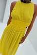 Yellow Ella Dress featuring a pleated texture, high neck and side cutouts on a 5ft5” model in a UK size 8.