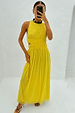Yellow Ella Dress featuring pleated detailing and side cut-outs, styled for feel good dressing in a mirror selfie.