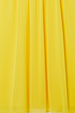 Yellow Ella Dress detail highlighting the yellow pleated fabric and its lightweight texture.