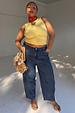 Blue Studded Barrel Jeans with side stud detailing and a barrel silhouette, styled with a yellow top.