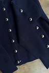 Navy Studded Cardigan in a navy knit featuring silver stud detailing and button front.