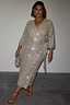 Thumbnail for Silver Sequin Kira Wrap Dress with a wrap tie waist and mid-length sleeves, showcasing inclusive sizing.