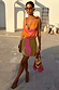 Abstract Beaded Fringe Bag with multicoloured glass beads and pink tassels, styled with a matching NFD print mini dress.