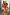 Thumbnail for Abstract Beaded Fringe Bag with green glass beads and pink tassels, held by a model in a coordinated plissé dress.