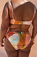 Abstract V Front Bikini Brief set featuring sunset tones and painterly brushstrokes on a curve model.