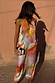 Abstract Lily multi-wear top in a vibrant multicoloured satin-esque print, styled with a halter-style neckline.