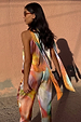 Abstract Lily Top featuring a vibrant multicoloured print and long tie neck fastenings draped over the shoulders.