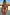 Thumbnail for Abstract V Front Bikini Brief with sunset tones and brushstroke print, styled on the beach.