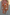 Thumbnail for Abstract Ruched Bikini Top in painterly sunset tones with beaded straps and gathered cup detailing on a beach.