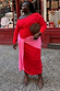 Thumbnail for Red and Pink Afia knit midi dress with wrap tie detailing and an off-the-shoulder fit for inclusive sizing.