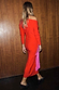Thumbnail for Red and Pink Afia Midi Dress in a soft knit with an off-the-shoulder silhouette and pink wrap tie detailing.