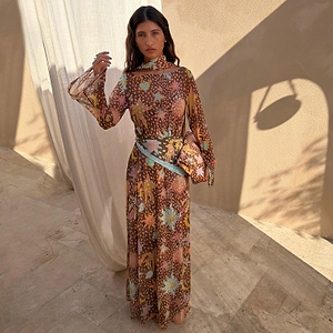 Star Fawn Aria Mesh Dress in brown with sun and star motifs and sheer flared sleeves for feel good dressing.