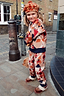 Thumbnail for NFD Kids Aspen Jogger and matching jumper with a geometric print worn by a young girl on a London street.