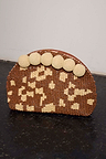 Jaden Beaded Clutch Bag featuring brown and cream leopard print beading and large cream crochet pom-poms.