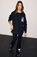 Black Sweatshirt with ecru signature embroidery in a slightly oversized fit, styled with matching embroidered trousers.