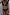 Thumbnail for Black Palm Embroidered Triangle Bikini with pink whipstitch detailing and gold palm motifs on a model.
