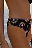 Black high leg bikini brief with palm embroidery and a contrast pink crochet stitch trim.