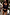 Thumbnail for Black Studded Rib Vest featuring gold stud detailing at the neckline, worn knotted over printed bikini bottoms.