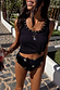 Black Studded Rib Vest featuring gold stud detailing at the neckline, worn knotted over printed bikini bottoms.