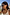 Thumbnail for Black Studded Acetate Sunglasses with silver detailing and branding, worn by a model in an outdoor vacation setting.