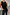 Thumbnail for Black Ribbed Tank wardrobe staple in soft stretch fabric, styled with leather-look trousers and gold jewellery.