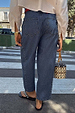 Blue denim Studded Barrel Jeans featuring silver studs on the pockets and side seams with a structured silhouette.