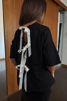 Black Bow Back T-Shirt with cream ribbon bow fastenings and an open back in a relaxed cotton fit.
